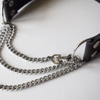 Black leather choker with silver chain on a white background
