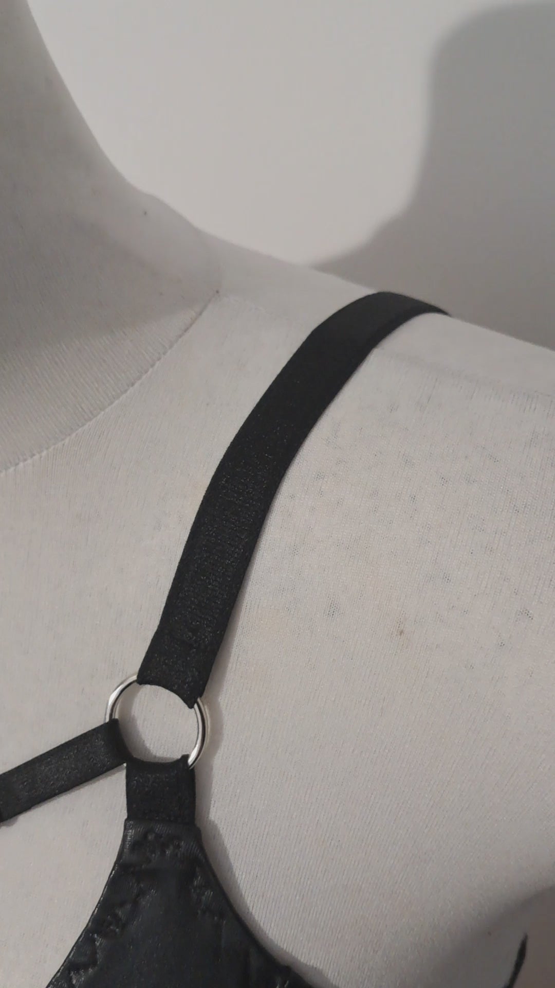 Video showing wet look bra on mannequin