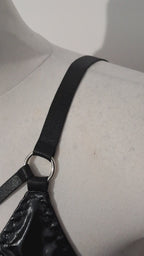 Video showing wet look triangle bra on mannequin