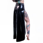 Person wearing a wet-look cut-out maxi skirt on a white background