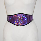 Holographic belt with a circular design on a mannequin against a white background