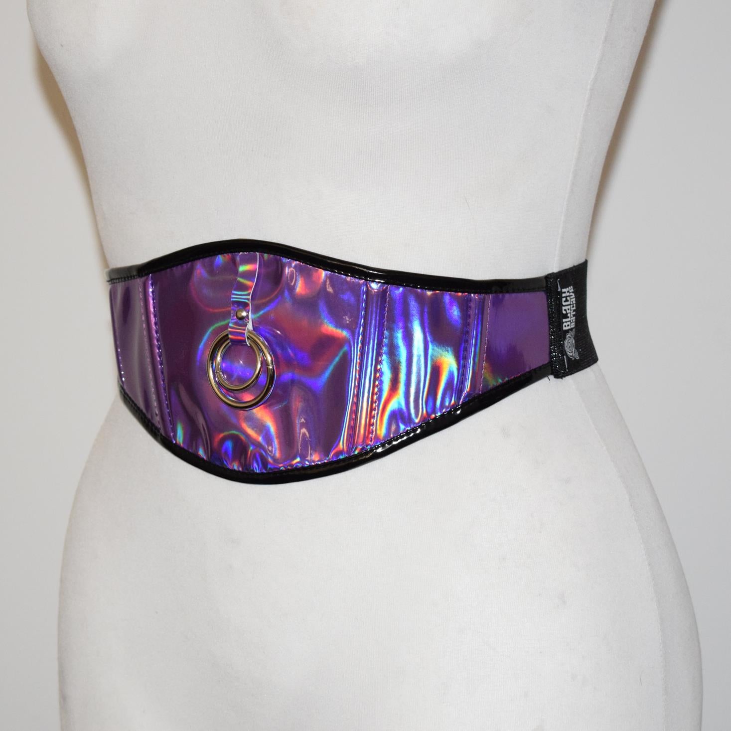 Holographic belt with a ring detail on a mannequin against a white background